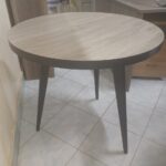 Round wooden dining table