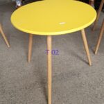 Small round table with a yellow top